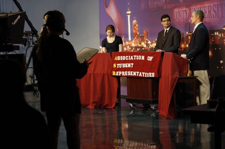 Kelsea Yarbrough, TigerTV floor manager, looks on as ASR presidential candidates Megan Smith and Justin Adler respond to questions posed by Sean Solis, ASR vice president, at the debates Wednesday, Feb. 20. Photo by Sarah Cooper.