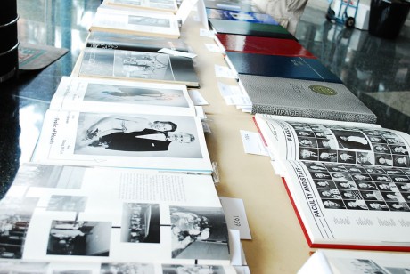 At the "Mirage Museum" displayed in Fall 2011 in Coates University Center lobby students got a chance to look at how the yearbook has evolved over the years. Now, the Mirage starts a new chapter in its history by printing in full color for the first time in its history. Photo by Carly Cowen.