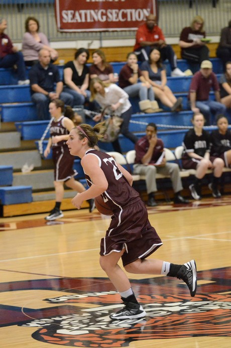 Junior forward Libby Druse carries the ball down court for the Tigers in the game against Southwestern on Feb. 6. Photo Aidan Kirksey.