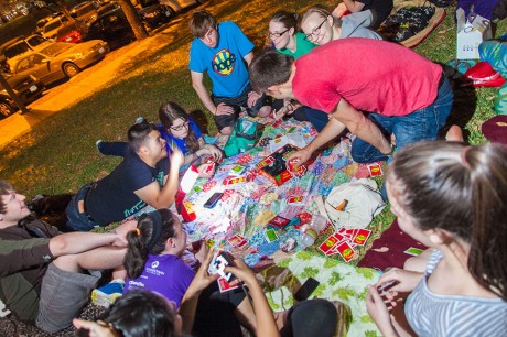 Students participate in H.O.P.E. Hall's "sleep-out" on the lawn outside Murchison residence hall. Participants slept overnight outside to raise awareness for homelessness. Photo by Anh-Viet Dinh.