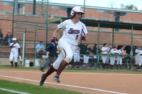 Sophomore Lauren Mercado rounds first base in a game against Schreiner University earlier in the season in which the women swept the series. Photo by Aidan Kirksey.