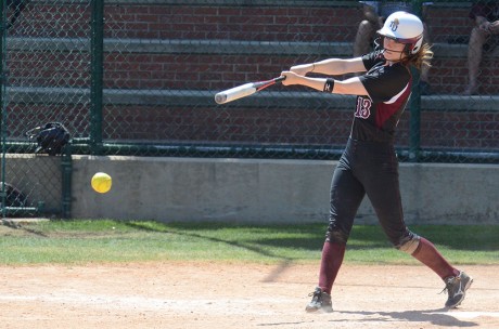 Junior second baseman Chrissy Armstrong makes a hit during last Sunday's softball game against Centenary College in which the Tigers won. Photo by Megan McLouhglin.