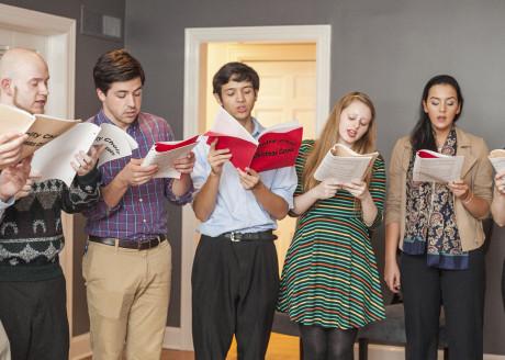 Students sing Christmas carols in Oakmont properties as a part of the Christmas on Oakmont tradition. Christmas on Oakmont will be held this Sunday following Vespers. Photo by Anh-Viet Dinh.